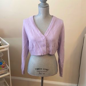 Purple cropped cardigan with purple buttons